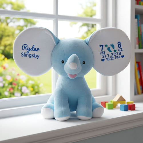 Front view of Crumble, a personalised blue plush elephant ready for embroidery 🐘