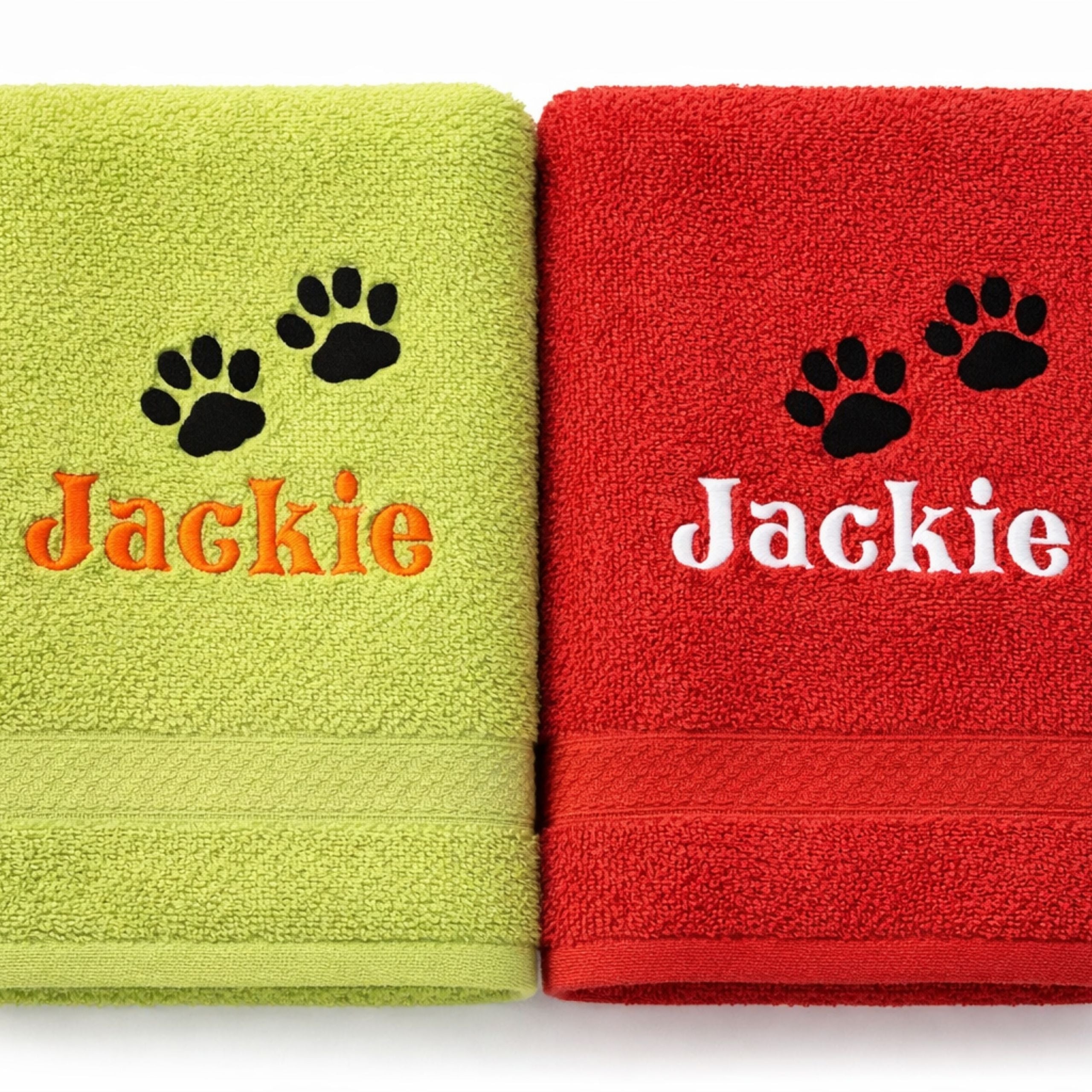 Personalised dog towel with name and paw prints being used after a walk