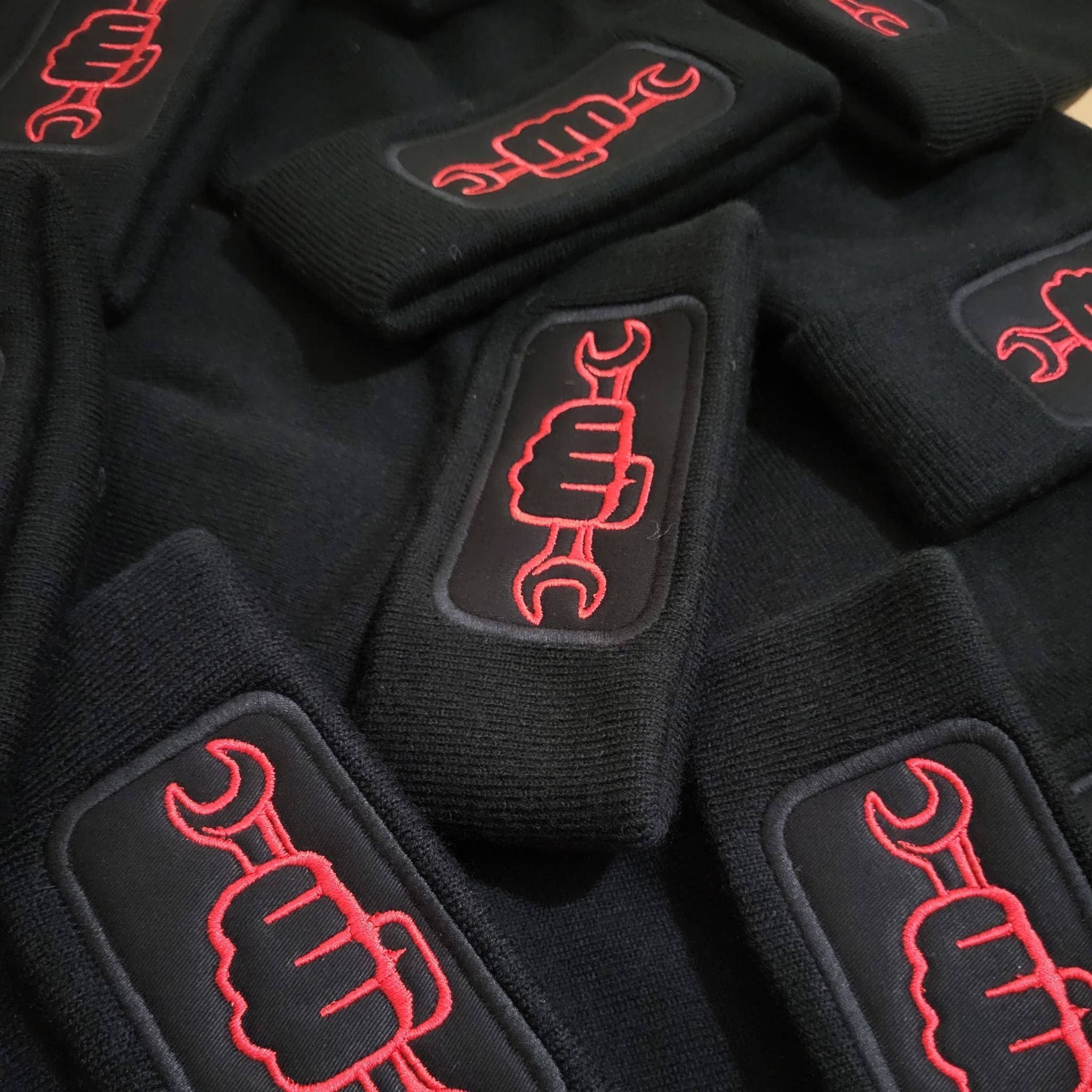 personalised embroidered workwear beanies in Black, White, Red, Grey, and Bright Royal