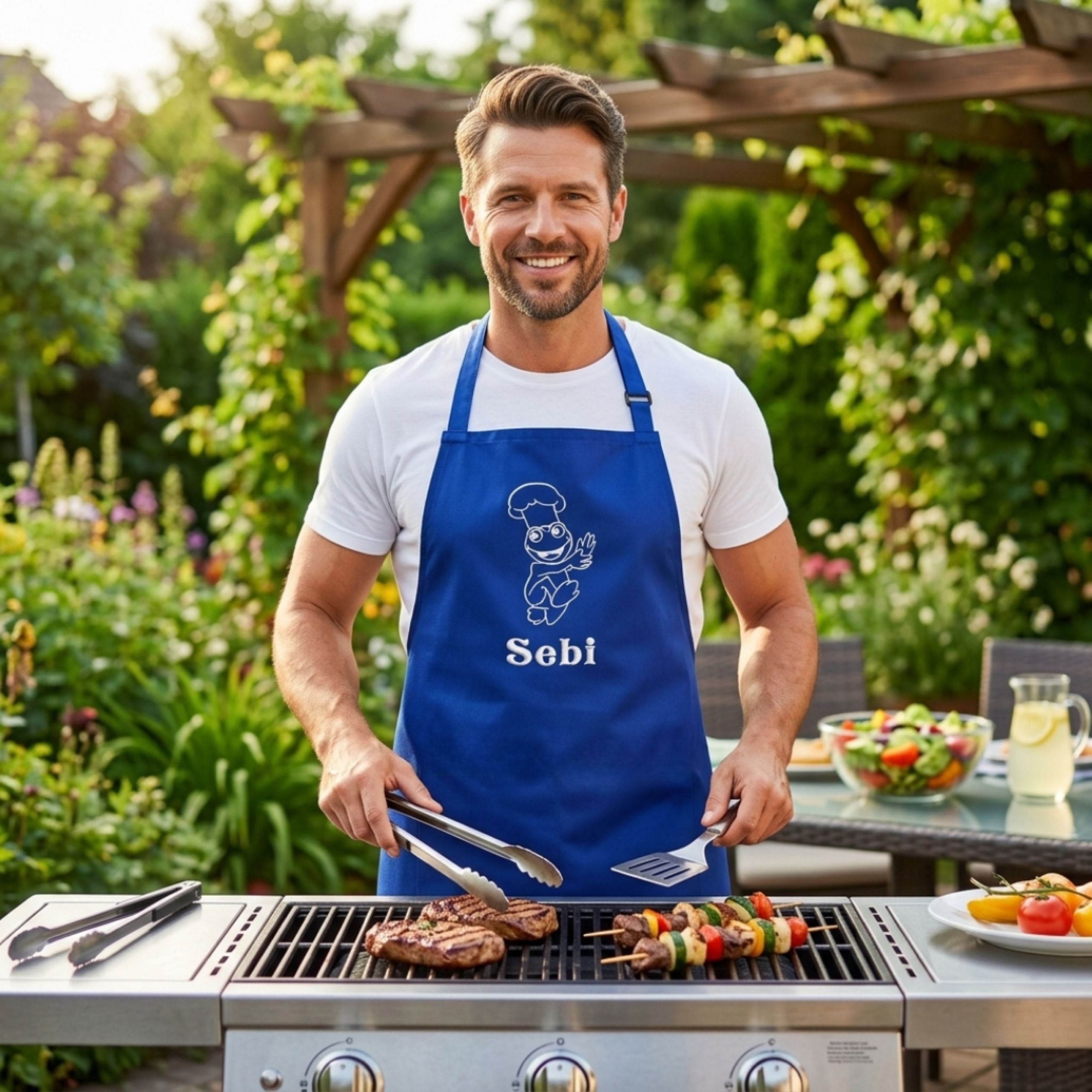 Man wearing personalised apron while grilling food outdoors at a barbecue