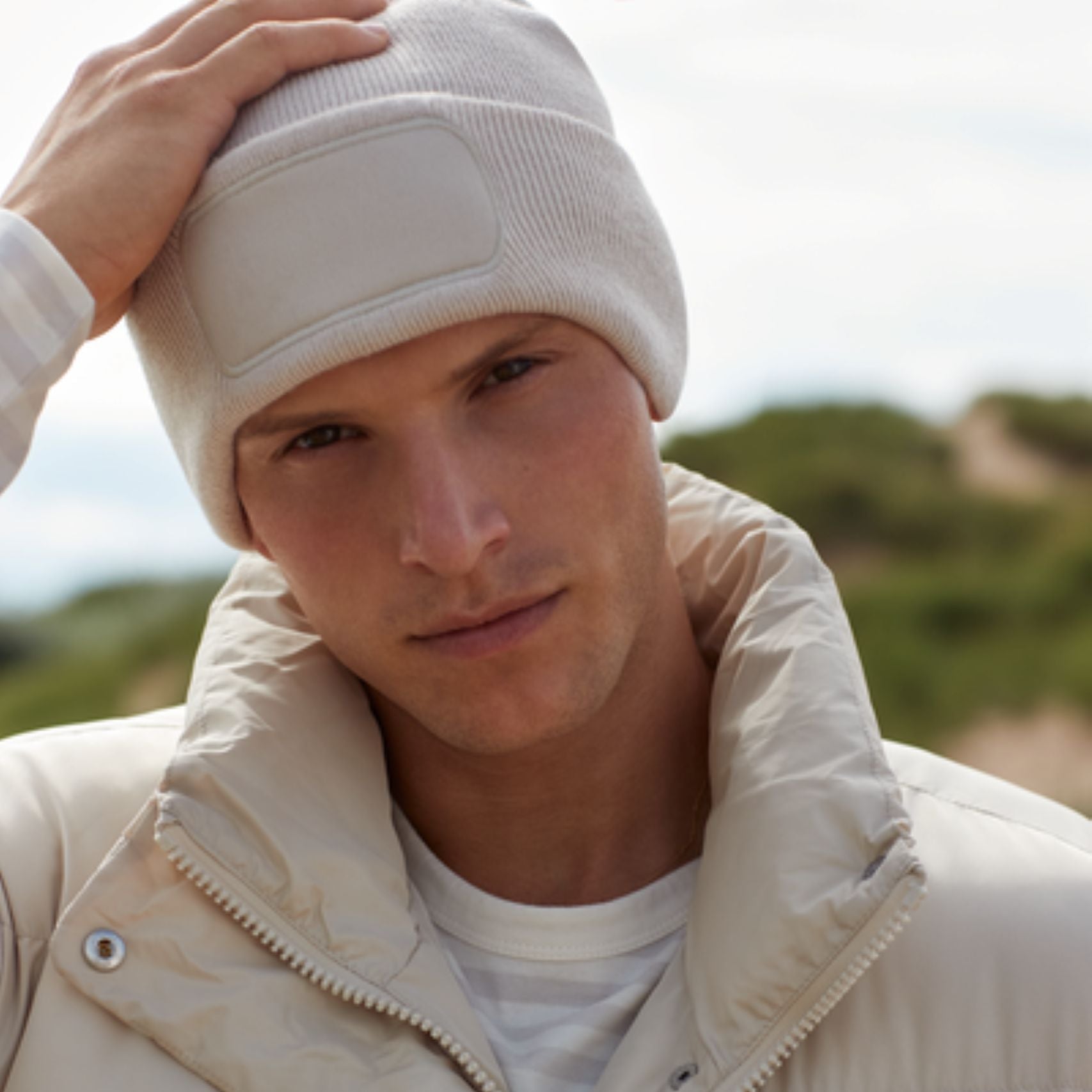 Team wearing personalised embroidered workwear beanies outdoors