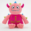 Personalised pink monster plush toy Monty with embroidered name, front view