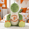 Close-up of Mossy personalised plush dinosaur with embroidered name