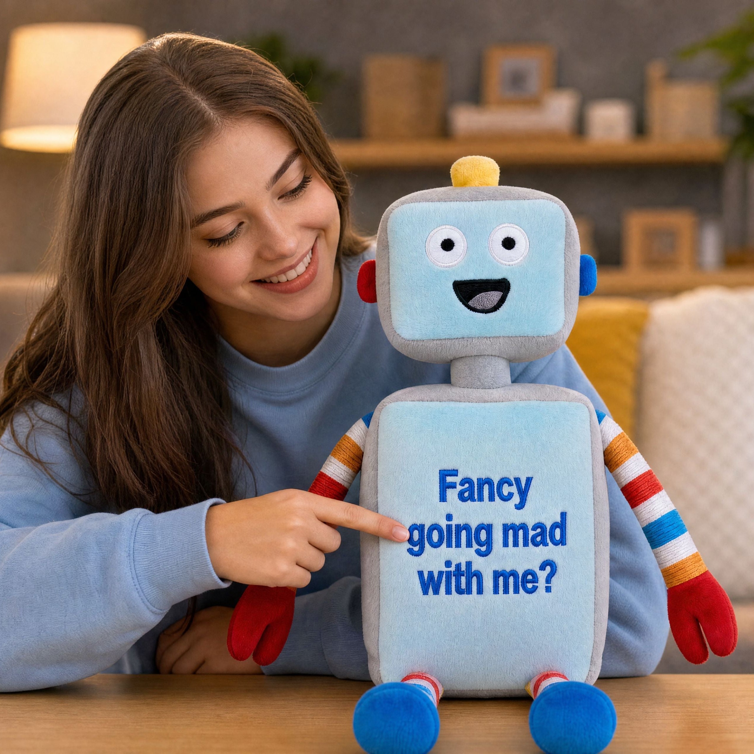 Girl holding a personalised robot plush toy with embroidered name