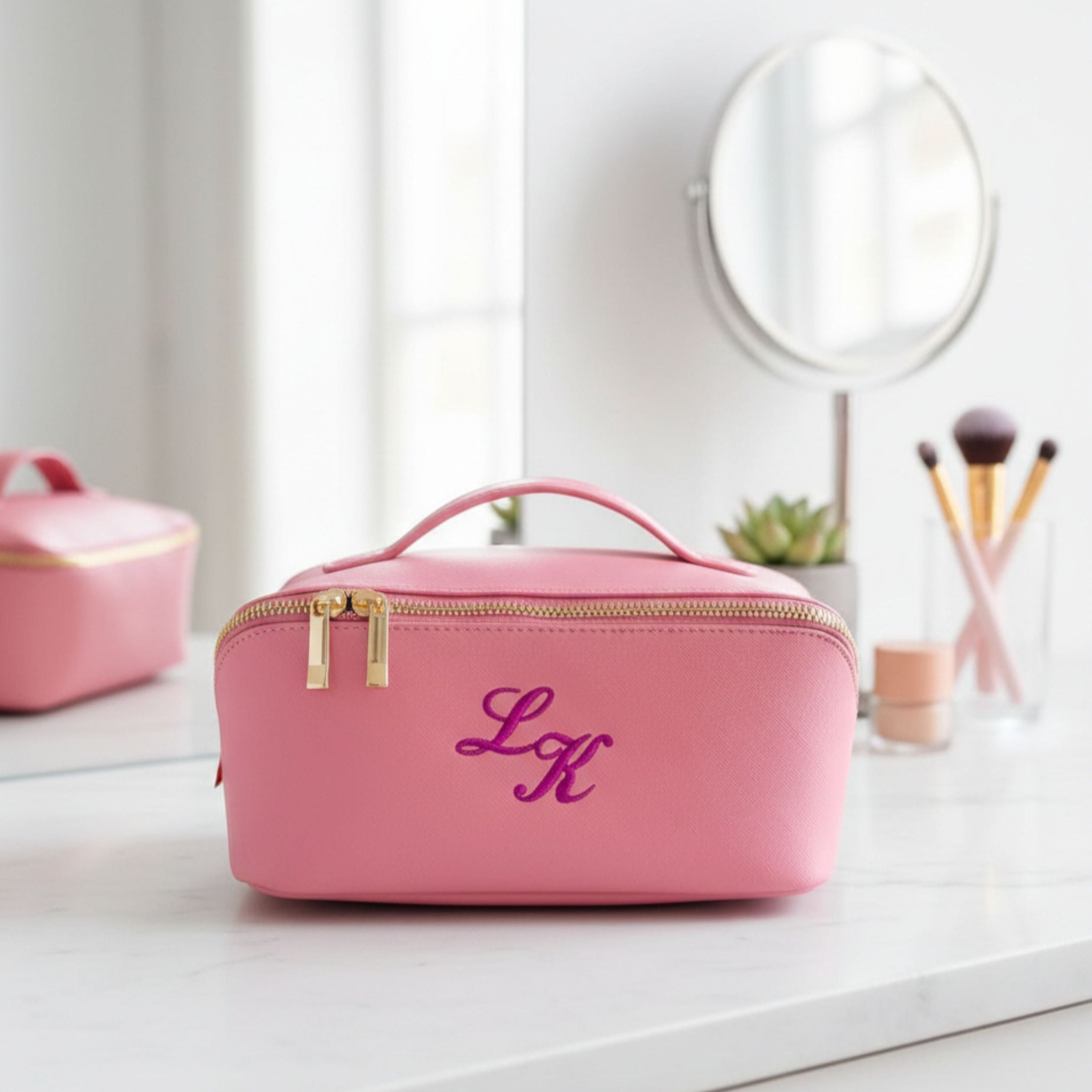 Personalised cosmetic bag with metallic embroidery styled on dressing table