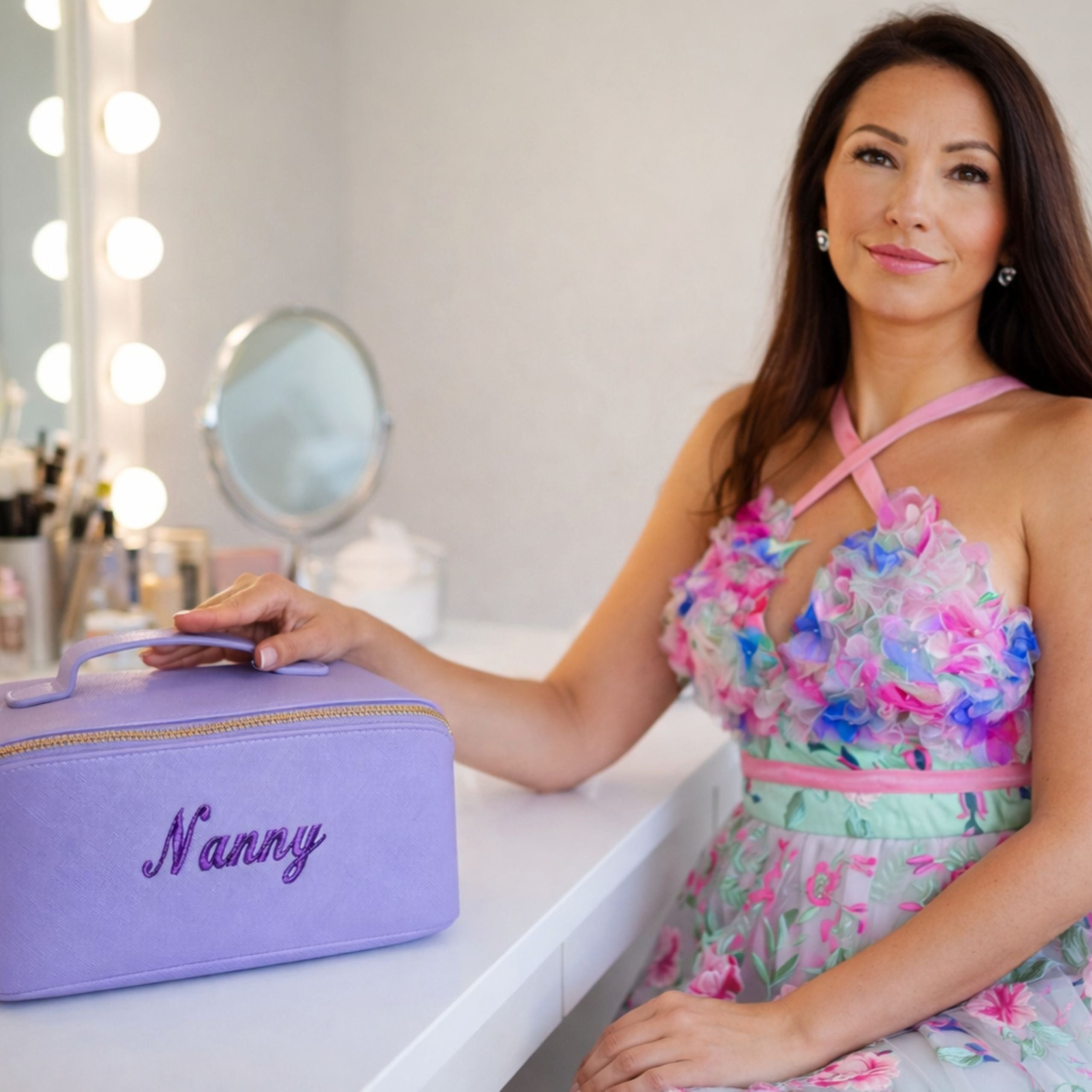 Personalised metallic embroidered cosmetic bag styled in flat lay