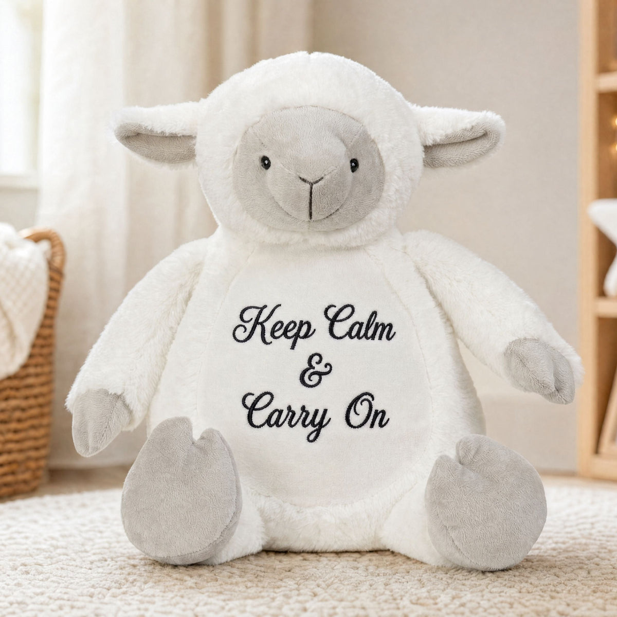Personalised lamb plush toy Honey sitting on a carpet with embroidered name