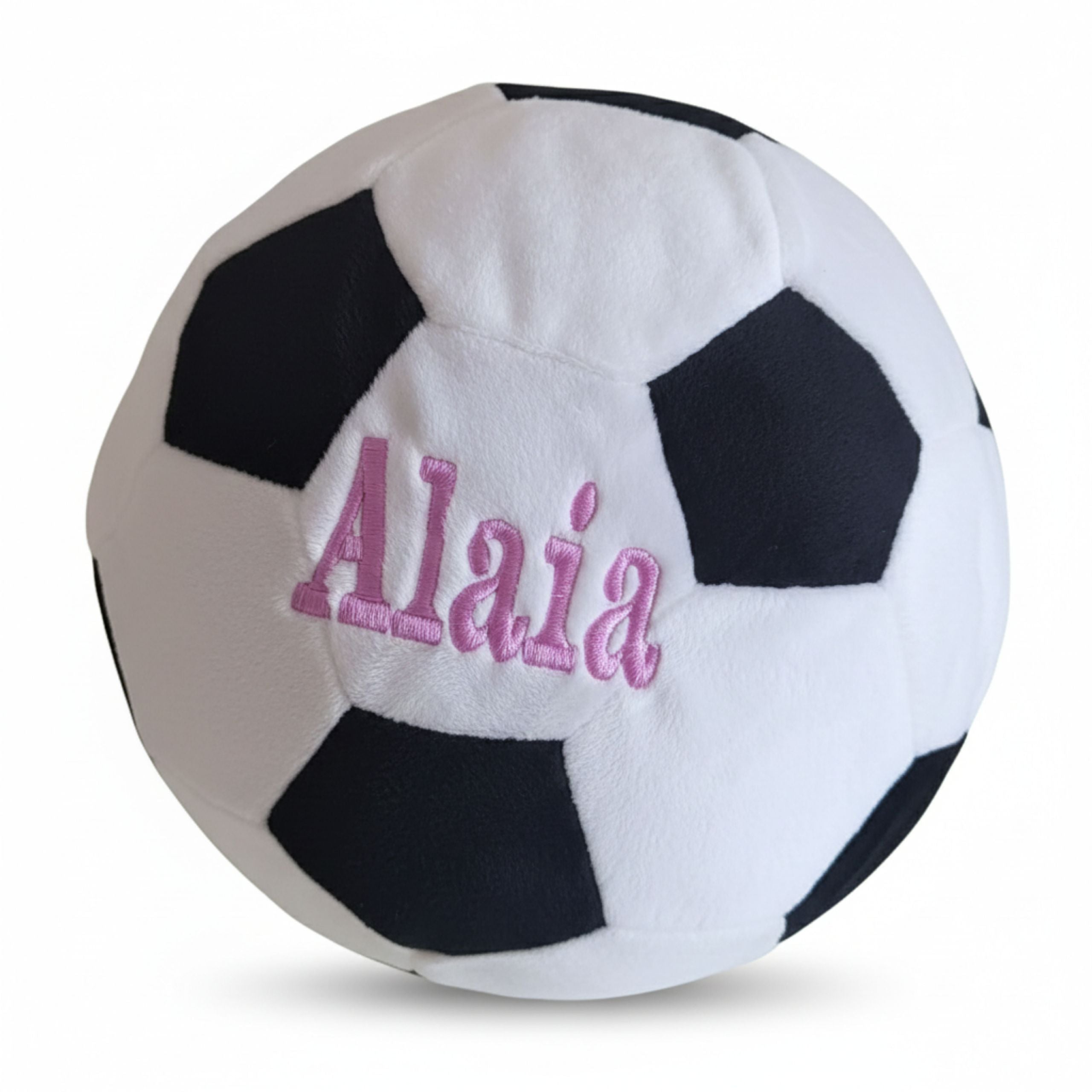 Striker Personalised Football Plush on floor, showing embroidered design