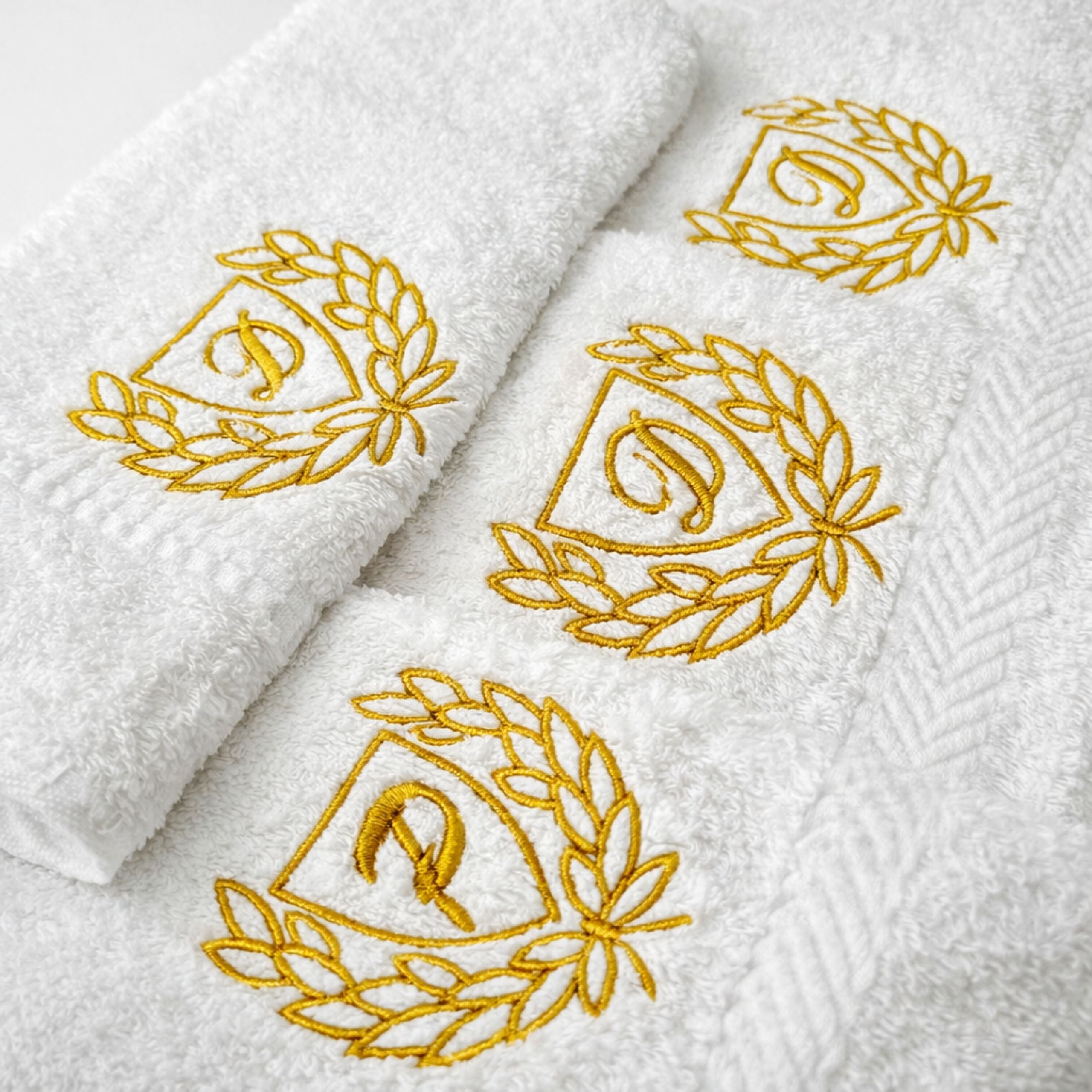 monogram embroidery detail on face cloth