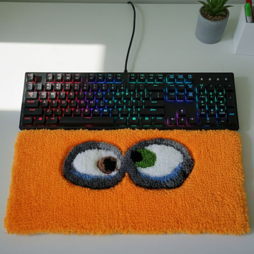 Handmade yellow cartoon eyes tufted keyboard rug with non-slip backing