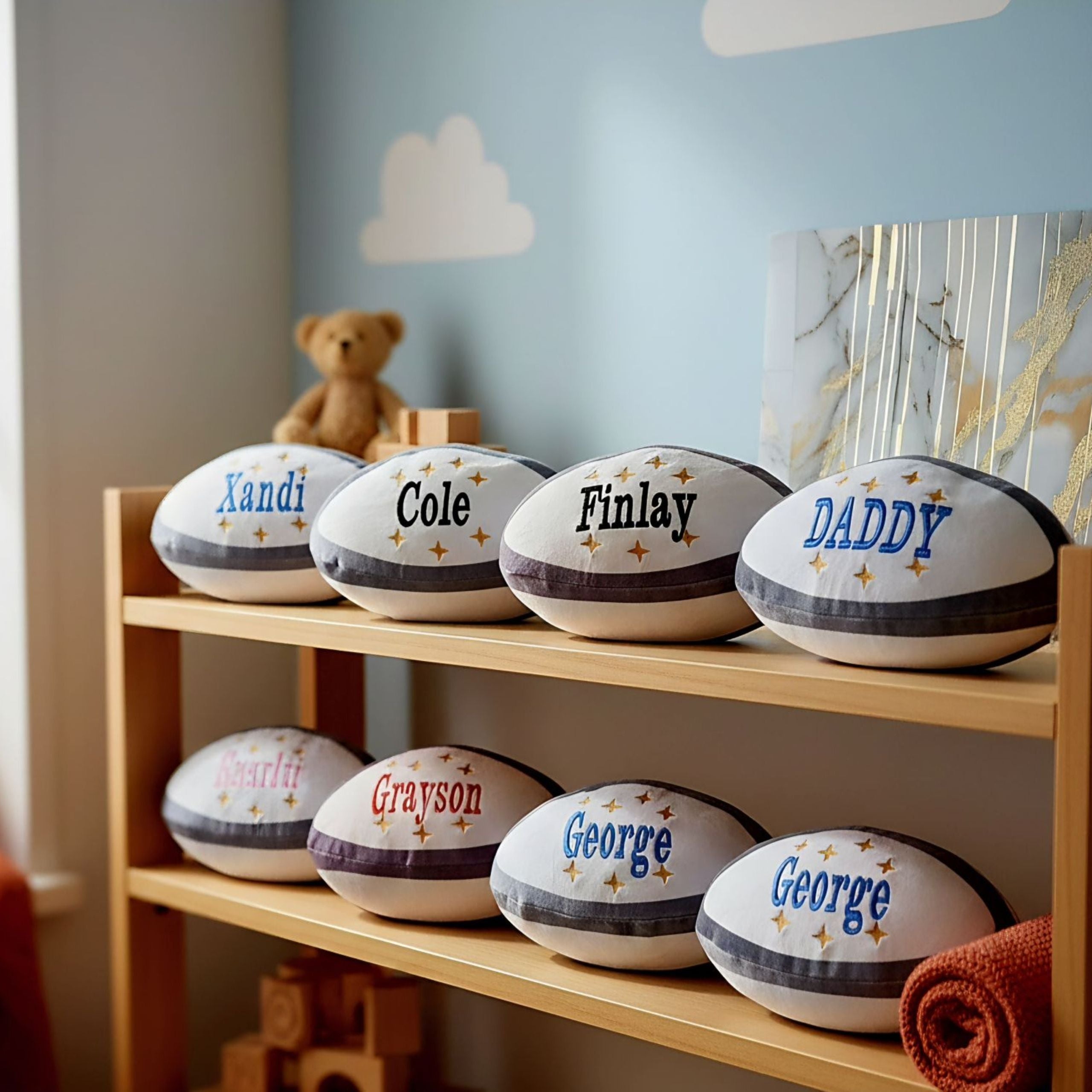 Front view of Zippy personalised plush rugby ball with embroidered name and stars